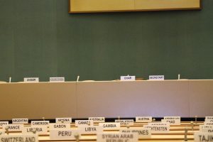 Board meeting room with the signs for different countries placed on top of the tables for the representatives to relate to the content of the article