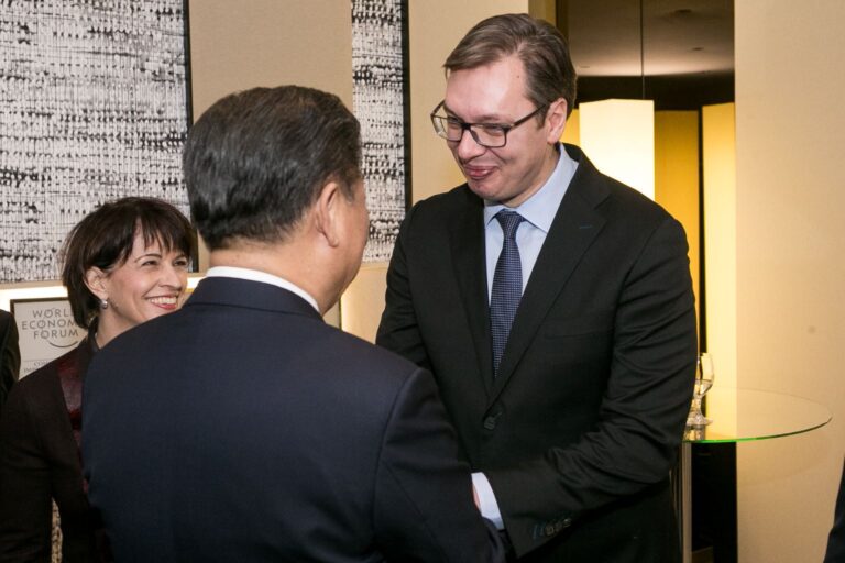 Aleksandar Vucic shaking Xi Jinping's hand
